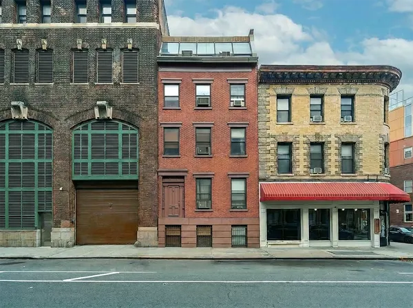 a front view of a building with a entrance
