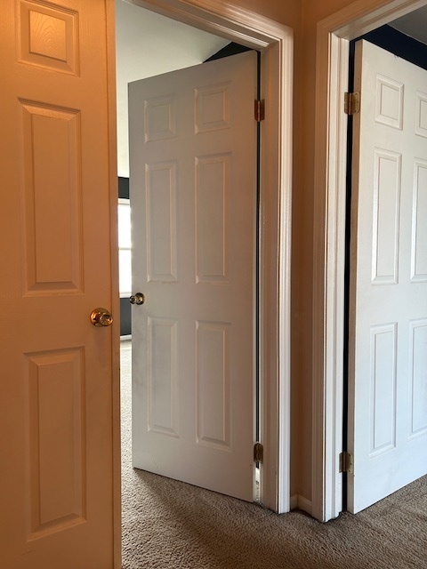 2093 Kettering Road Hoffman Estates, IL 60169 - Photo 13 of 28 a view of a hallway with closet area