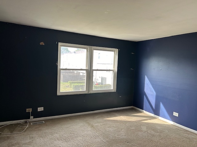 2093 Kettering Road Hoffman Estates, IL 60169 - Photo 20 of 28 a view of an empty room with a window