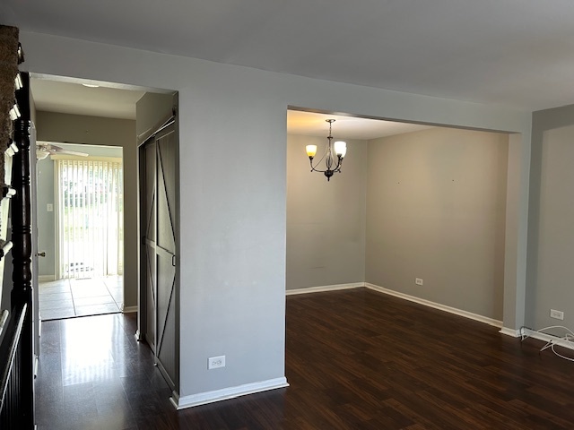 2093 Kettering Road Hoffman Estates, IL 60169 - Photo 4 of 28 wooden floor in an empty room