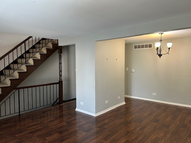2093 Kettering Road Hoffman Estates, IL 60169 - Photo 5 of 28 a view of a hallway with wooden floor and staircase