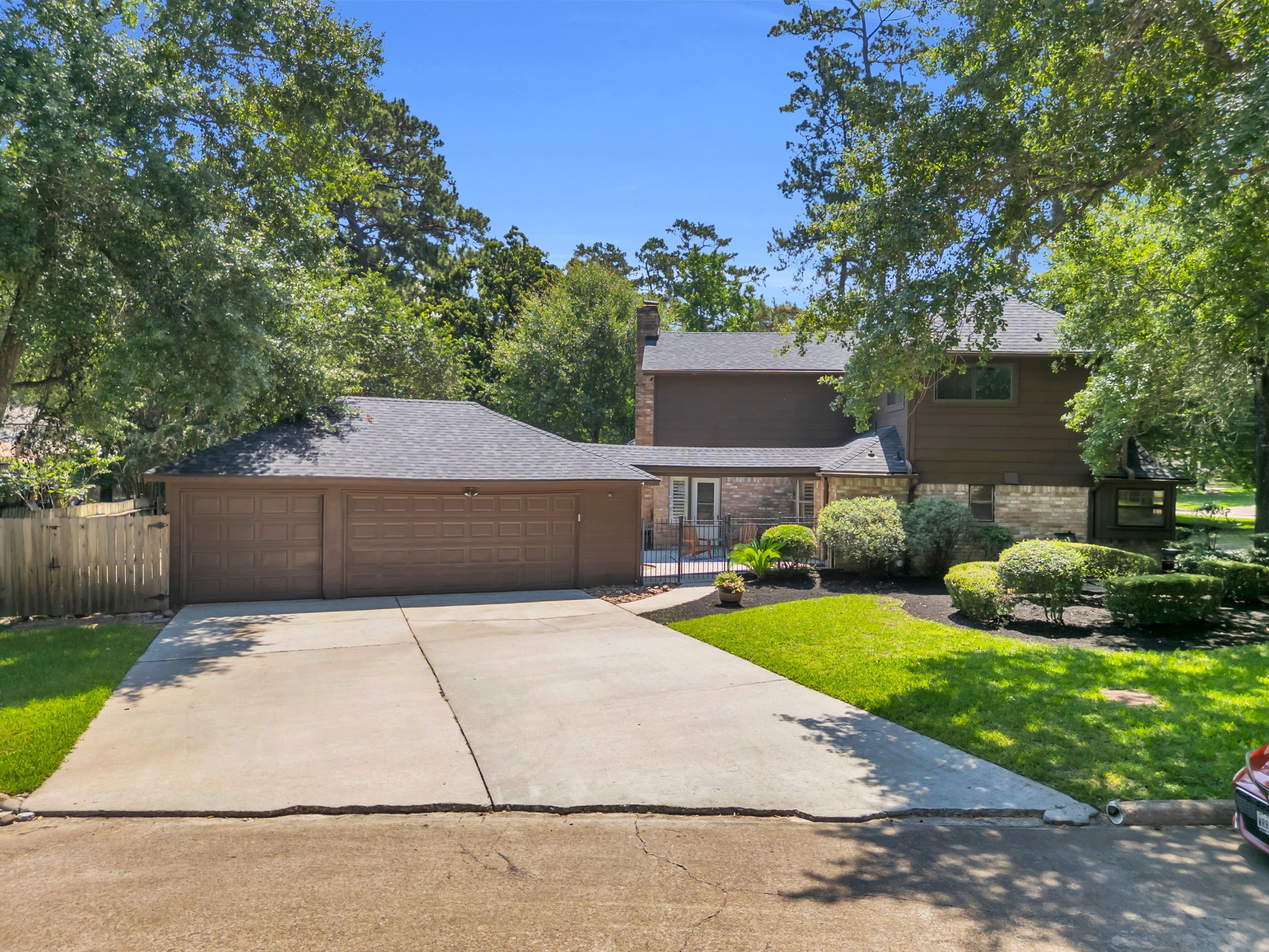 6514 Larkmount Drive Spring, TX 77389 - Photo 39 of 41 Home features a spacious three-car garage with room for cars, storage, projects & more!
