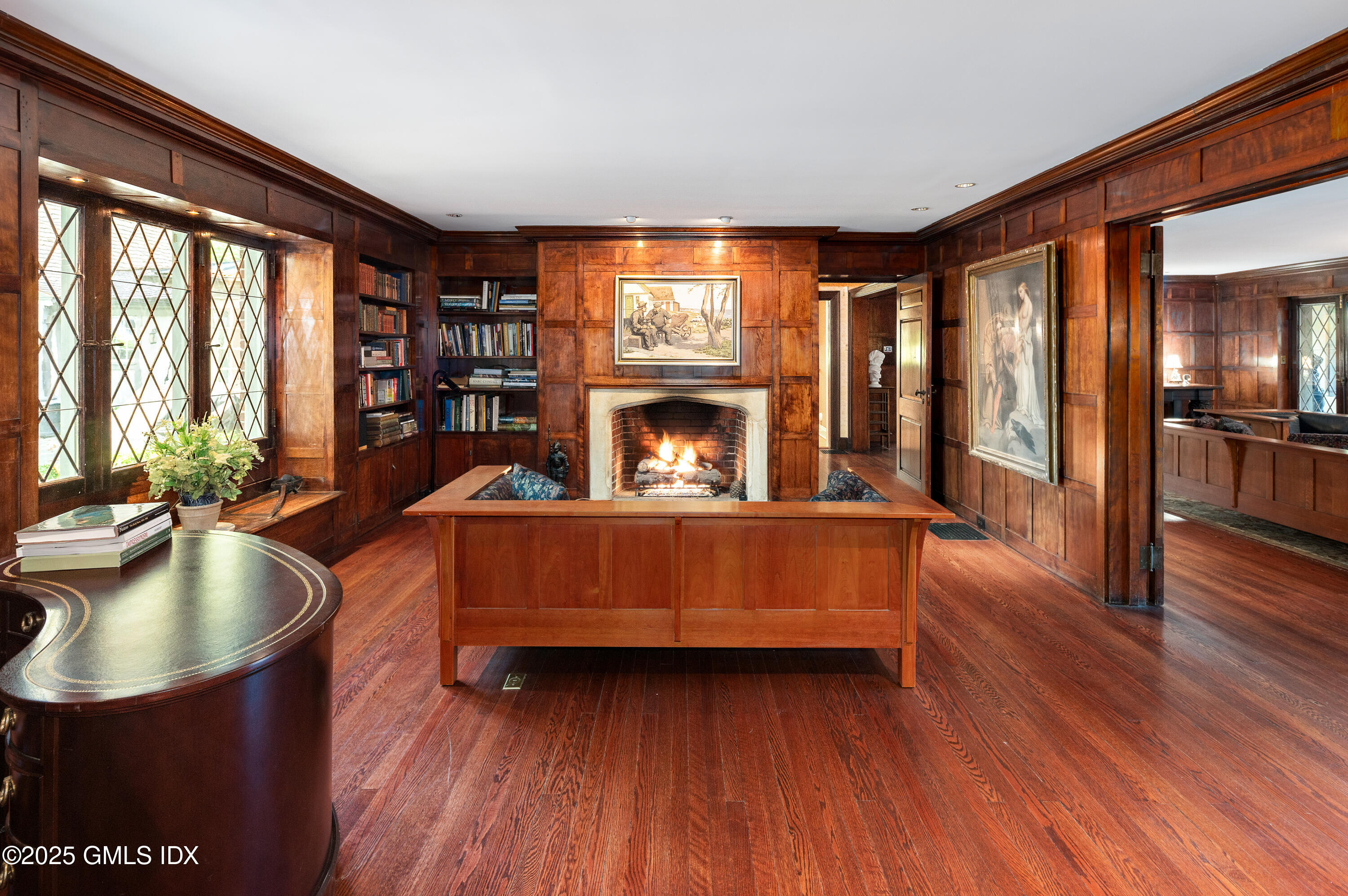214 Good Hill Road Weston, CT 06883 - Photo 18 of 80 a living room with furniture and a fireplace