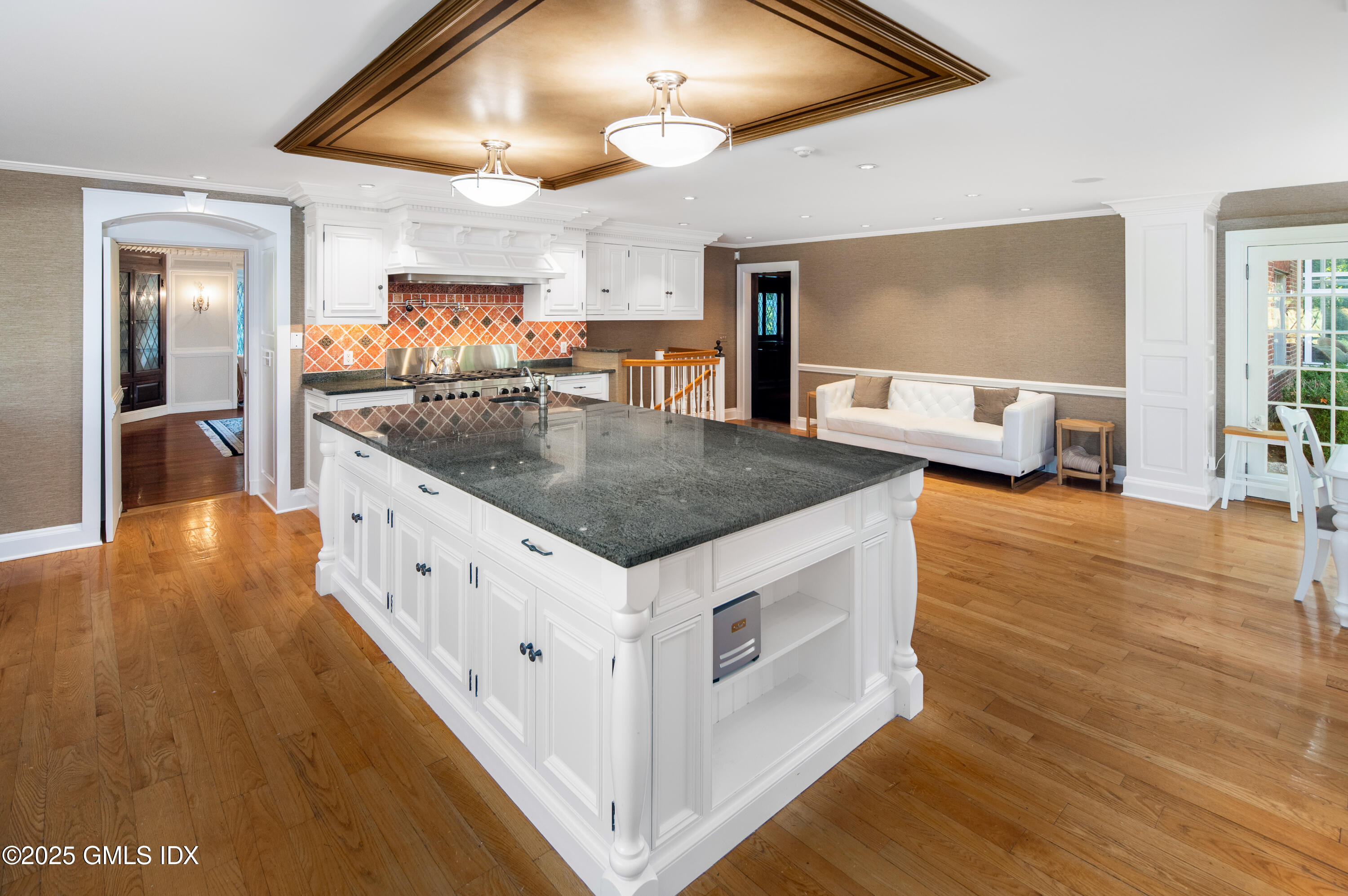 214 Good Hill Road Weston, CT 06883 - Photo 21 of 80 a kitchen with stainless steel appliances granite countertop a sink and a stove