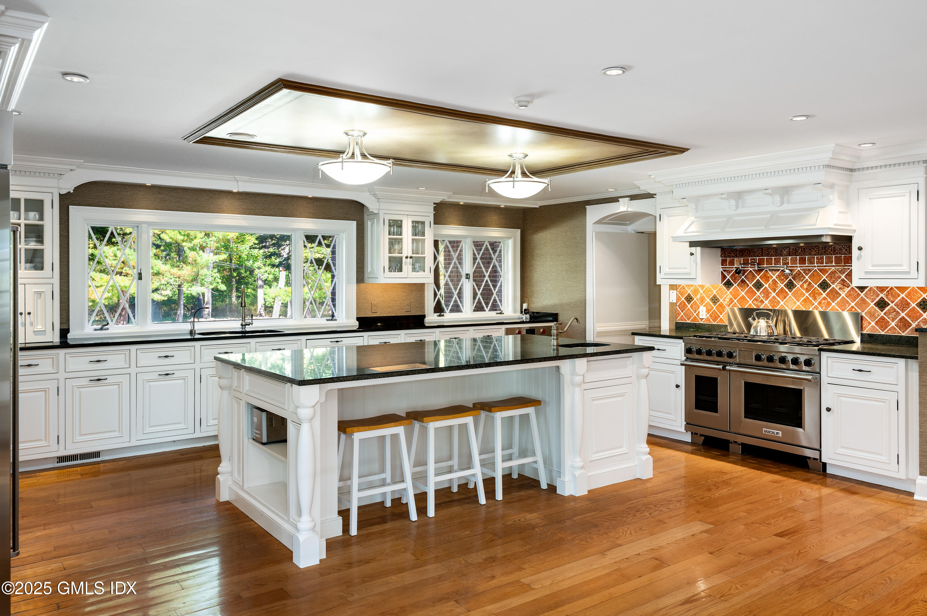214 Good Hill Road Weston, CT 06883 - Photo 24 of 80 a kitchen with a stove a sink and a refrigerator