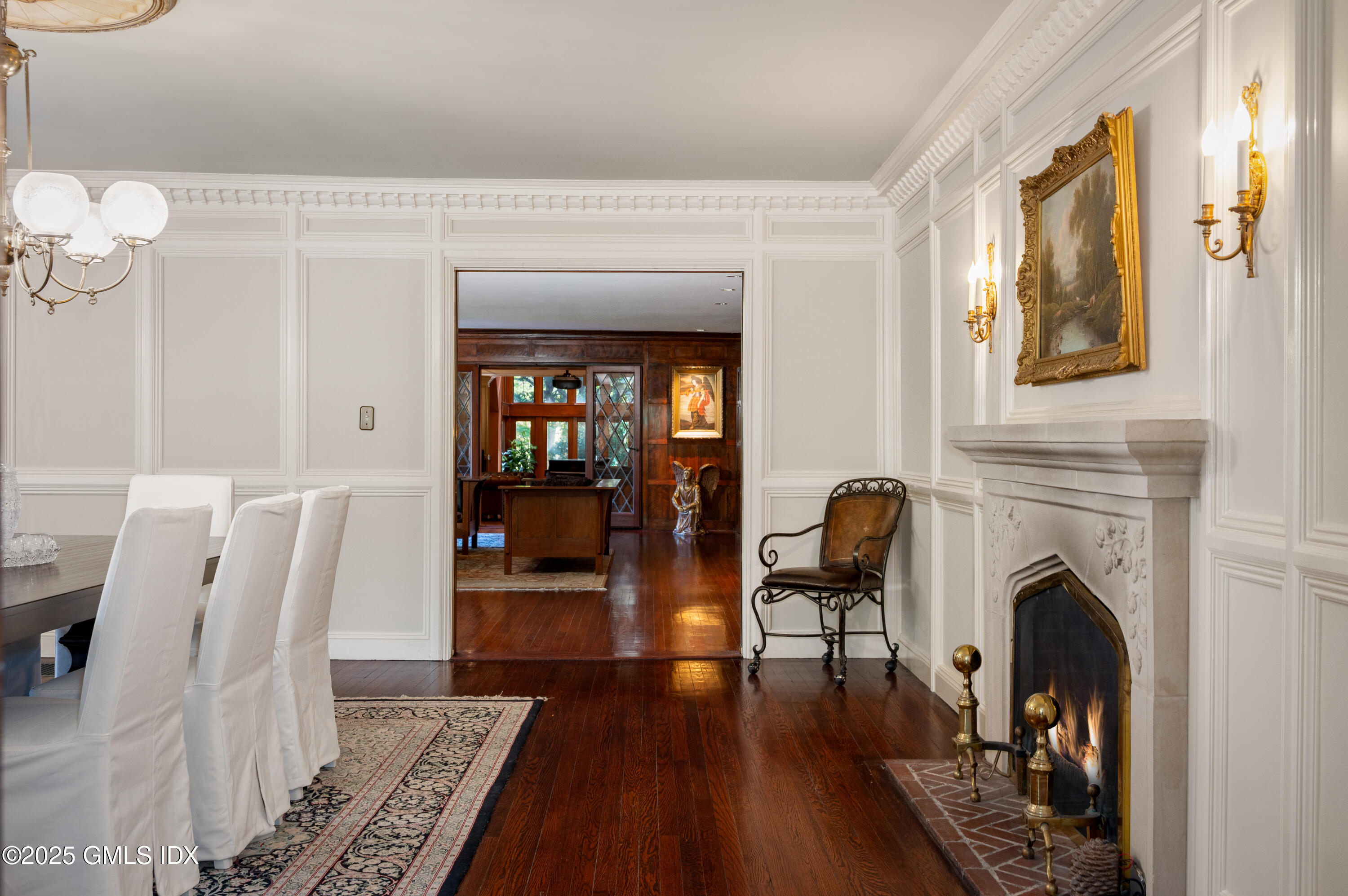 214 Good Hill Road Weston, CT 06883 - Photo 29 of 80 a living room with furniture and a fireplace