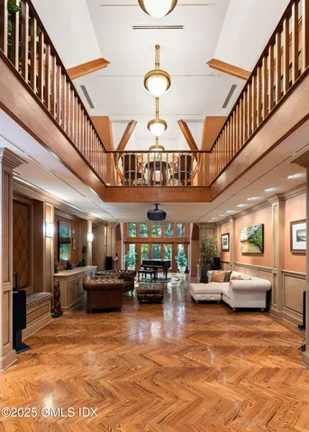 a bathroom with a sink toilet a mirror and shower