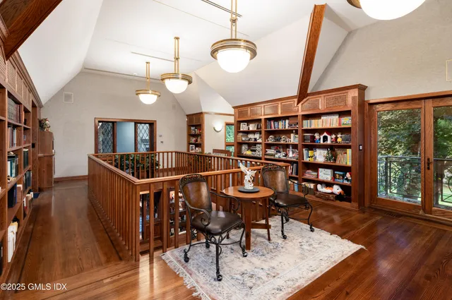 a front view of house with yard and outdoor seating