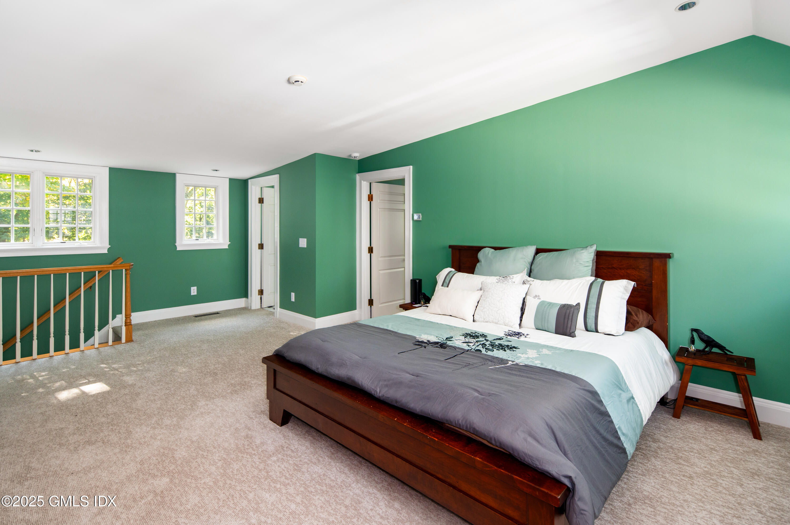 214 Good Hill Road Weston, CT 06883 - Photo 60 of 80 a bedroom with a bed and green walls