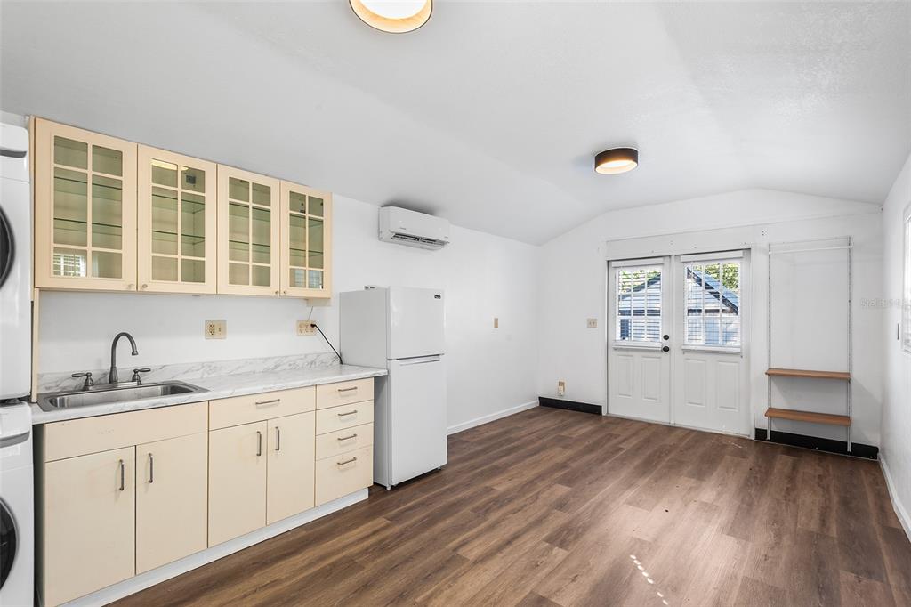 810 22nd Street North St. Petersburg, FL 33713 - Photo 24 of 37 a kitchen with a sink cabinets and wooden floor