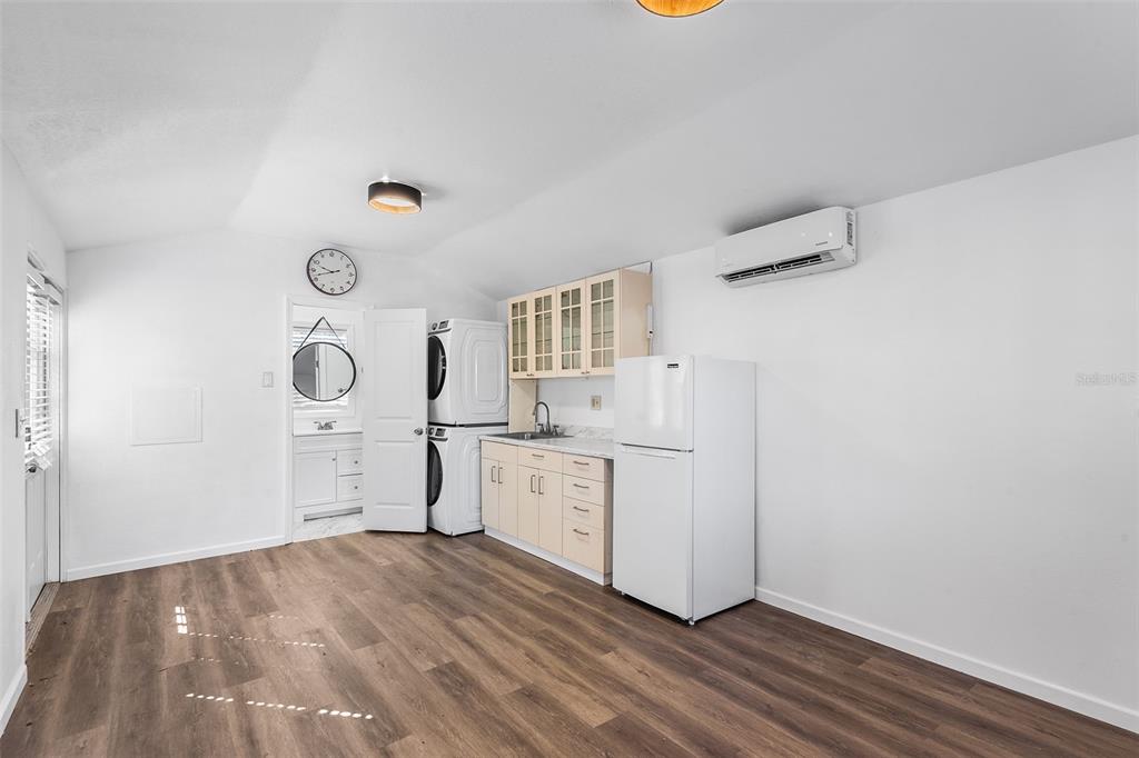 810 22nd Street North St. Petersburg, FL 33713 - Photo 27 of 37 a view of a kitchen with wooden floor and electronic appliances