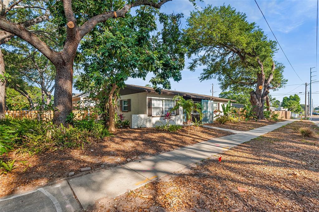 810 22nd Street North St. Petersburg, FL 33713 - Photo 33 of 37 a front view of a house with a yard and trees
