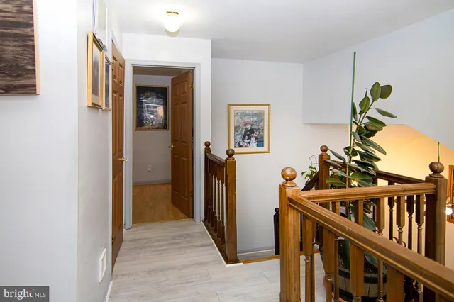 a view of a bedroom from a hallway
