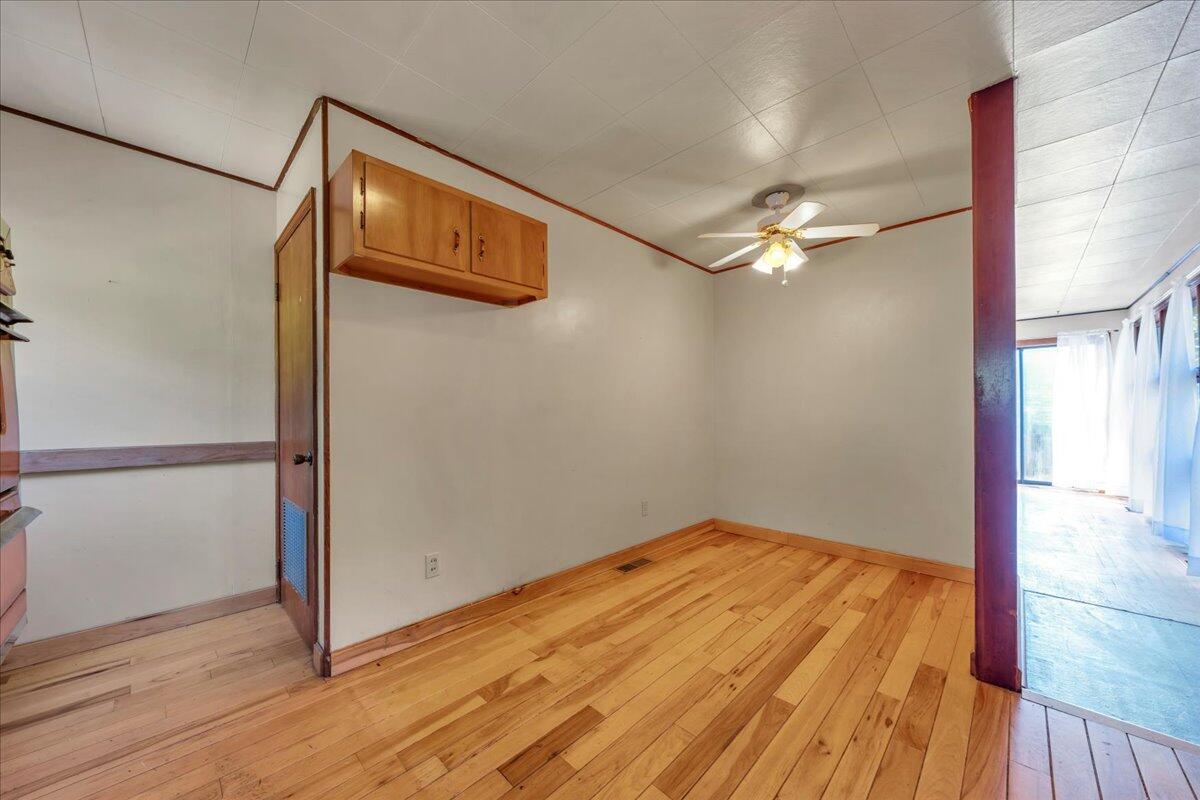 201 Long Avenue Covington, VA 24426 - Photo 13 of 43 a view of a room with wooden floor