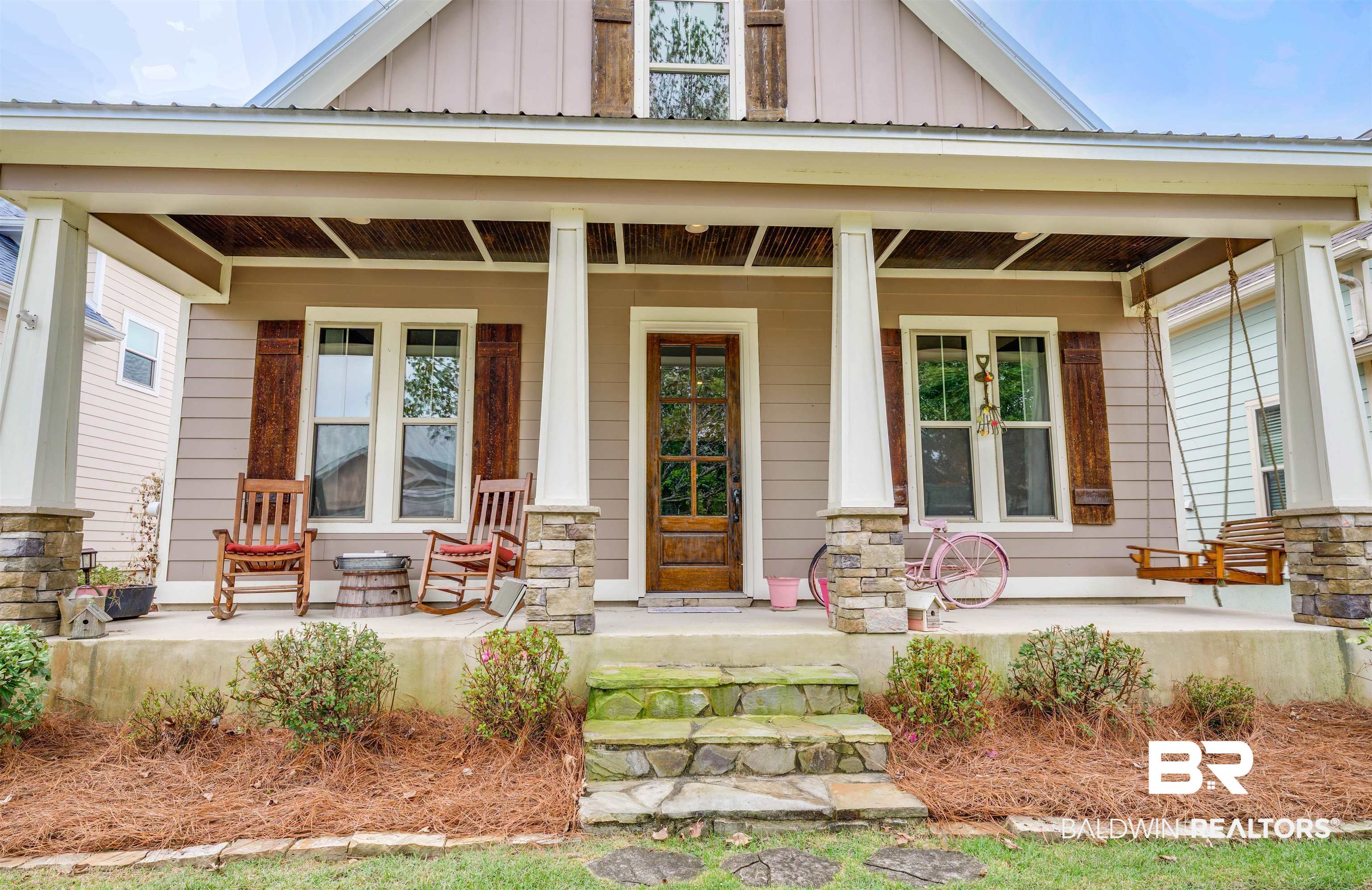 1119 Pink Poppy Lane Foley, AL 36535 - Photo 2 of 38 Property entrance featuring board and batten siding and covered porch