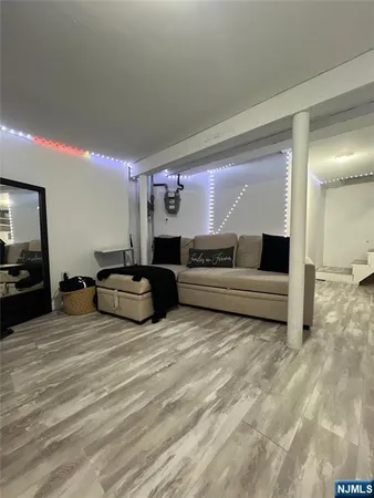 a kitchen with a refrigerator and cabinets