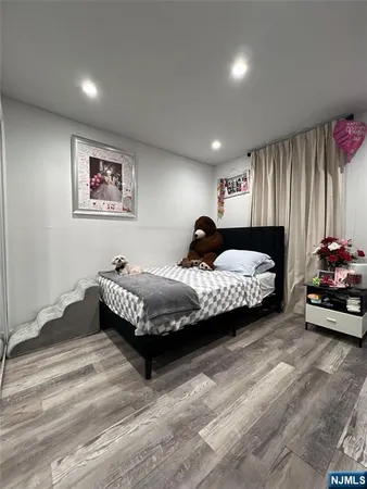 a bed room with a bed and a walk in closet