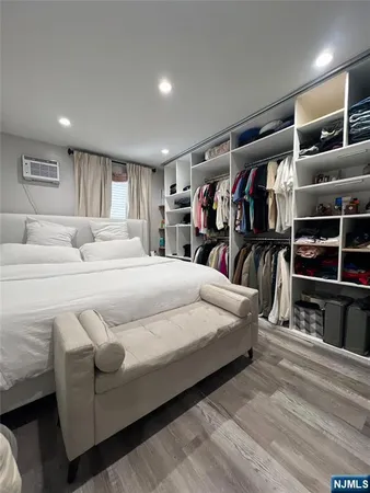 a bathroom with a toilet a sink and shower