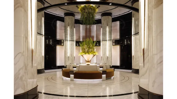 a kitchen with a sink and a mirror