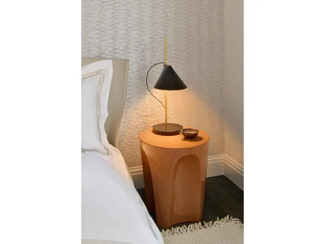 a bathroom with a toilet and a mirror