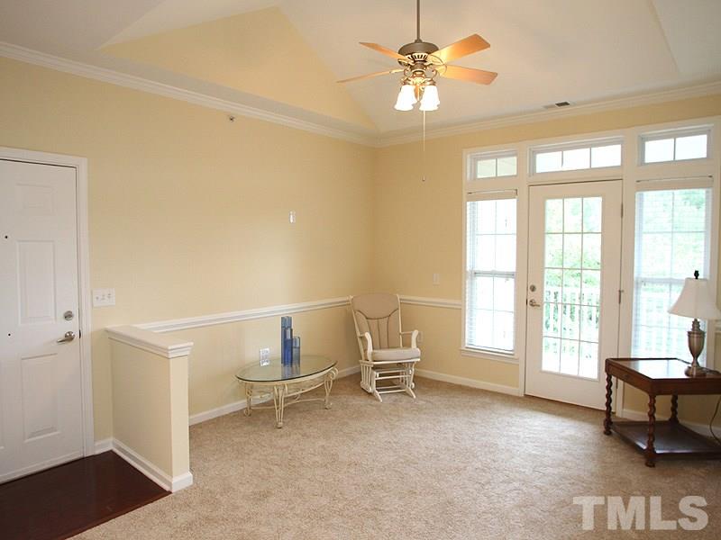 Open living room with beautiful cathedral ceiling