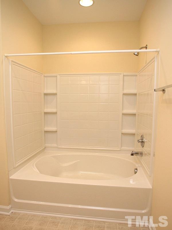 534 Weather Ridge Lane, Unit 18 Cary, NC 27513 - Photo 14 of 21 The master bathroom features a luxurious, deep, garden tub to soak your troubles away