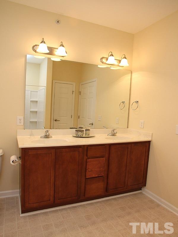 534 Weather Ridge Lane, Unit 18 Cary, NC 27513 - Photo 15 of 21 The master bath also features a double vanity and a linen closet