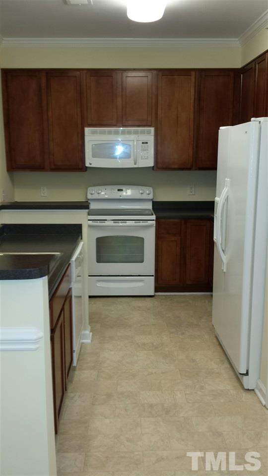534 Weather Ridge Lane, Unit 18 Cary, NC 27513 - Photo 10 of 21 The kitchen is set up for easy use.
