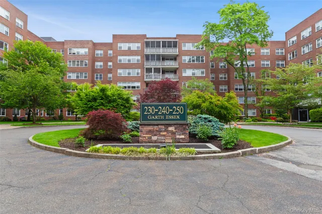 a front view of building and outdoor space