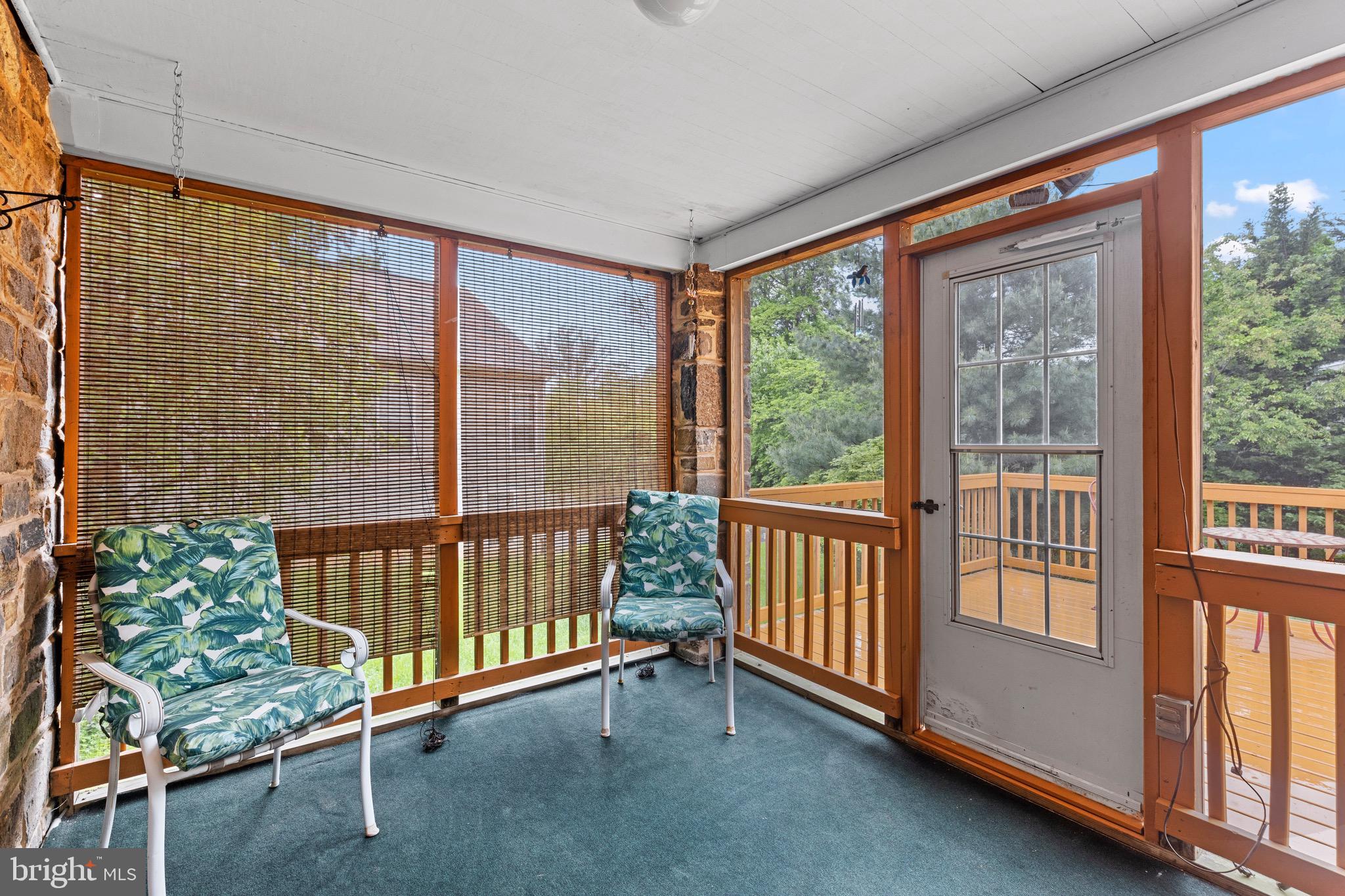 9214 Frederick Road Ellicott City, MD 21042 - Photo 31 of 41 screened porch off of the kitchen
