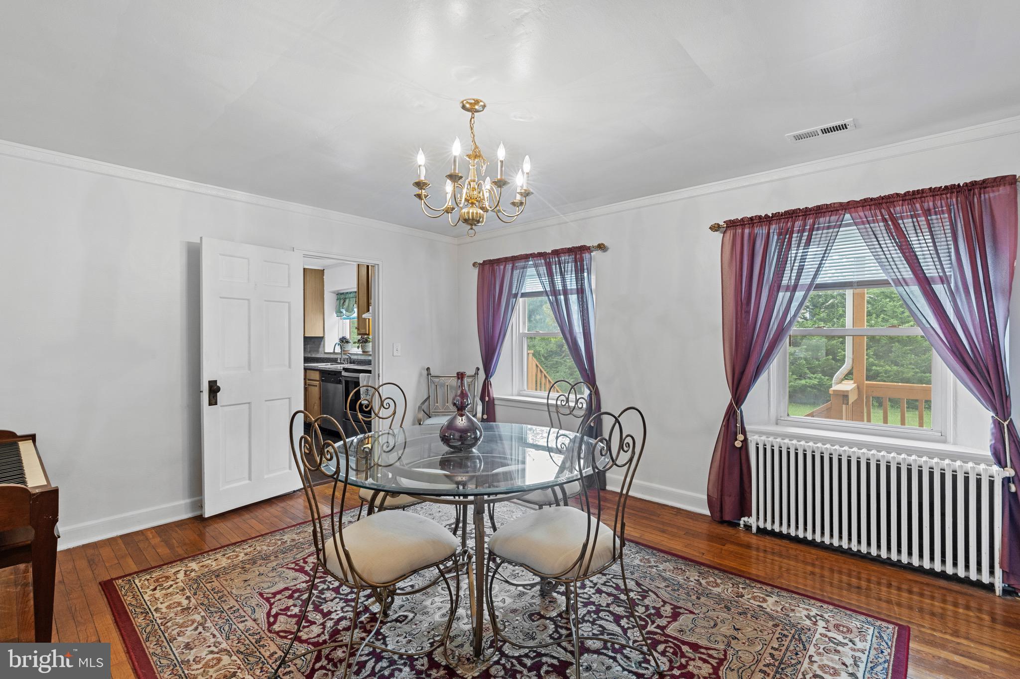 9214 Frederick Road Ellicott City, MD 21042 - Photo 10 of 41 two windows allowing natural light to stream in