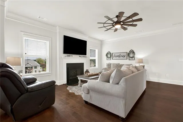 a kitchen with granite countertop a sink and a stove top oven