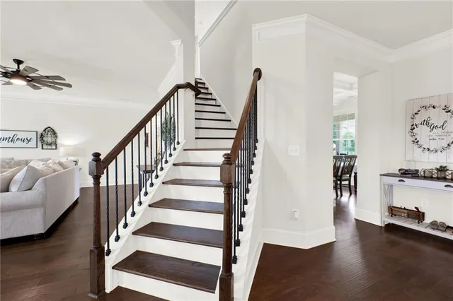 a view of an empty room with stairs