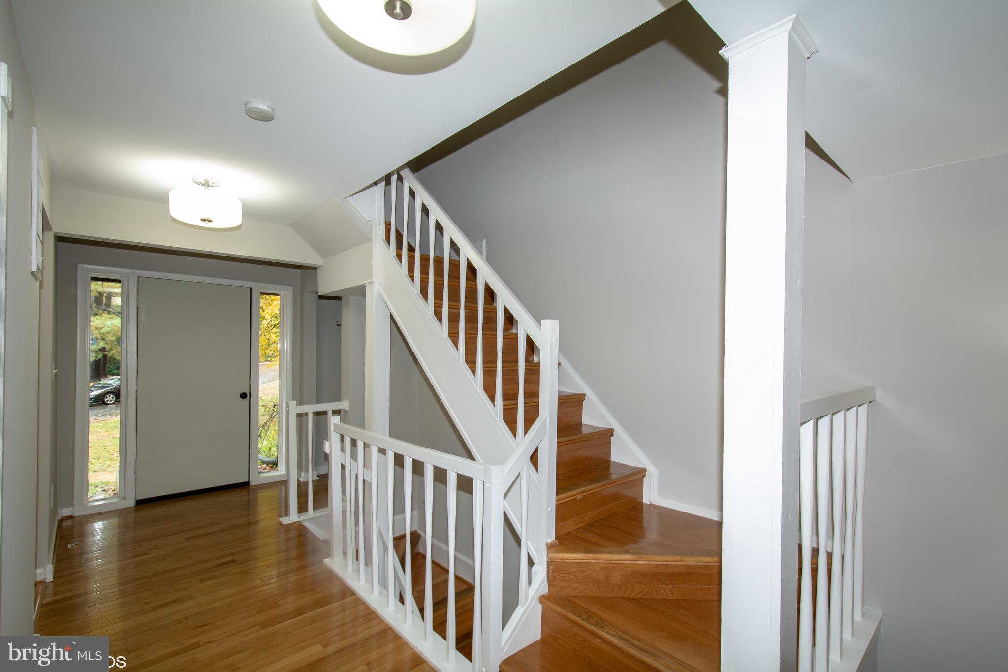 2103 Glencourse Lane Reston, VA 20191 - Photo 2 of 31 New Light Fixtures, Hardwoods, Elegant White Rails