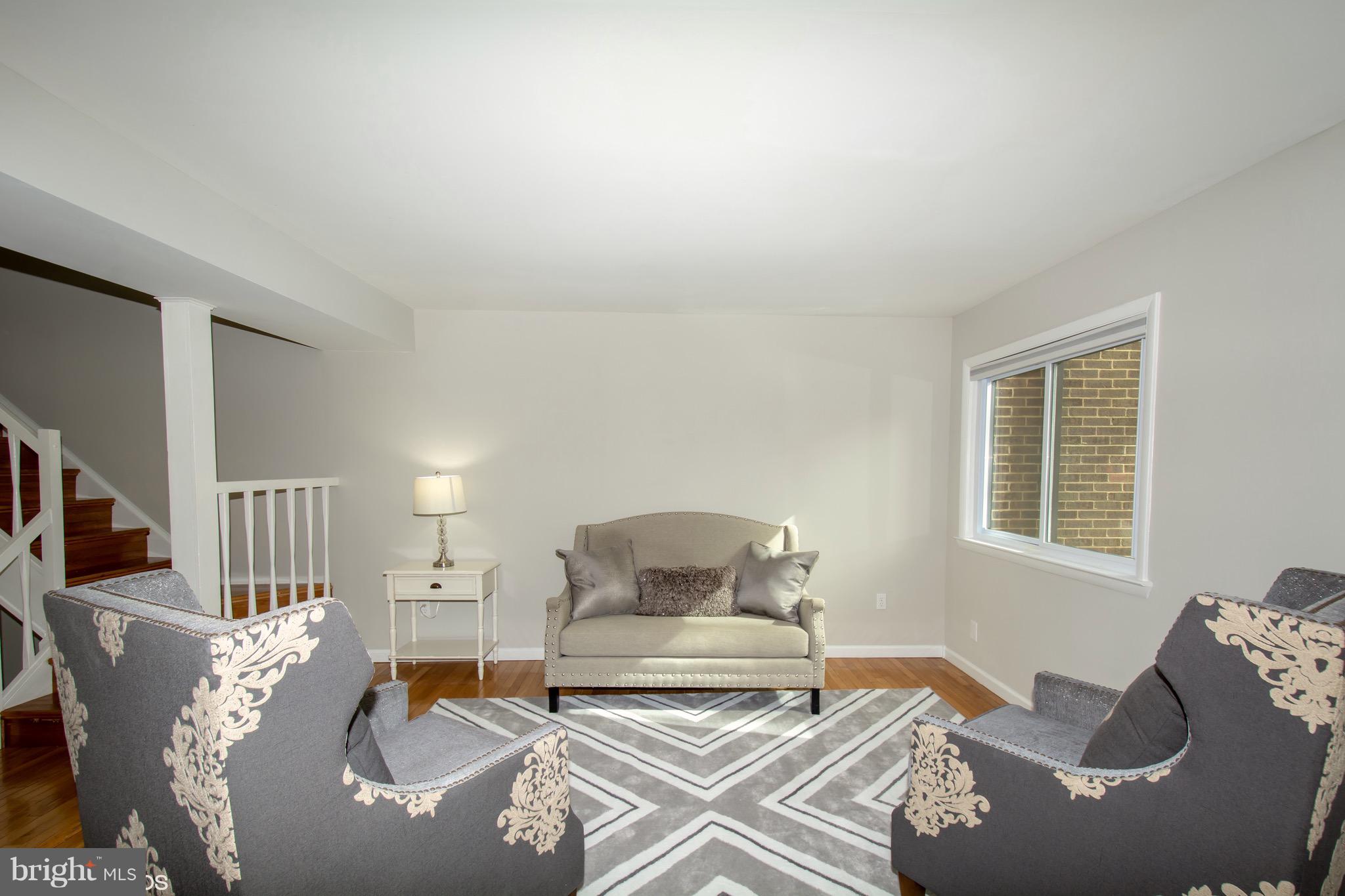 2103 Glencourse Lane Reston, VA 20191 - Photo 3 of 31 Step into your chic living room.