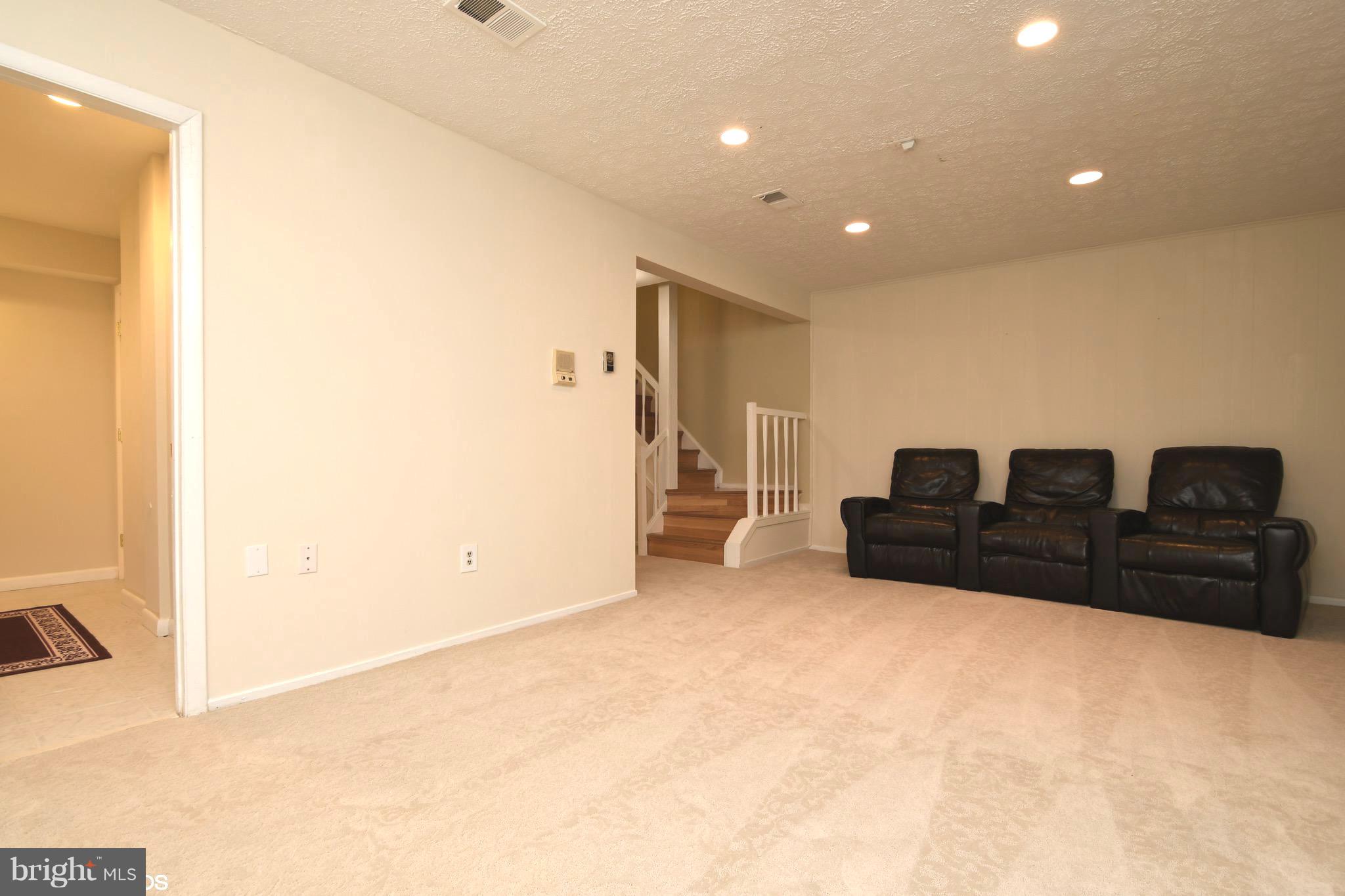 2103 Glencourse Lane Reston, VA 20191 - Photo 24 of 31 OPEN Recroom area with brand new carpet