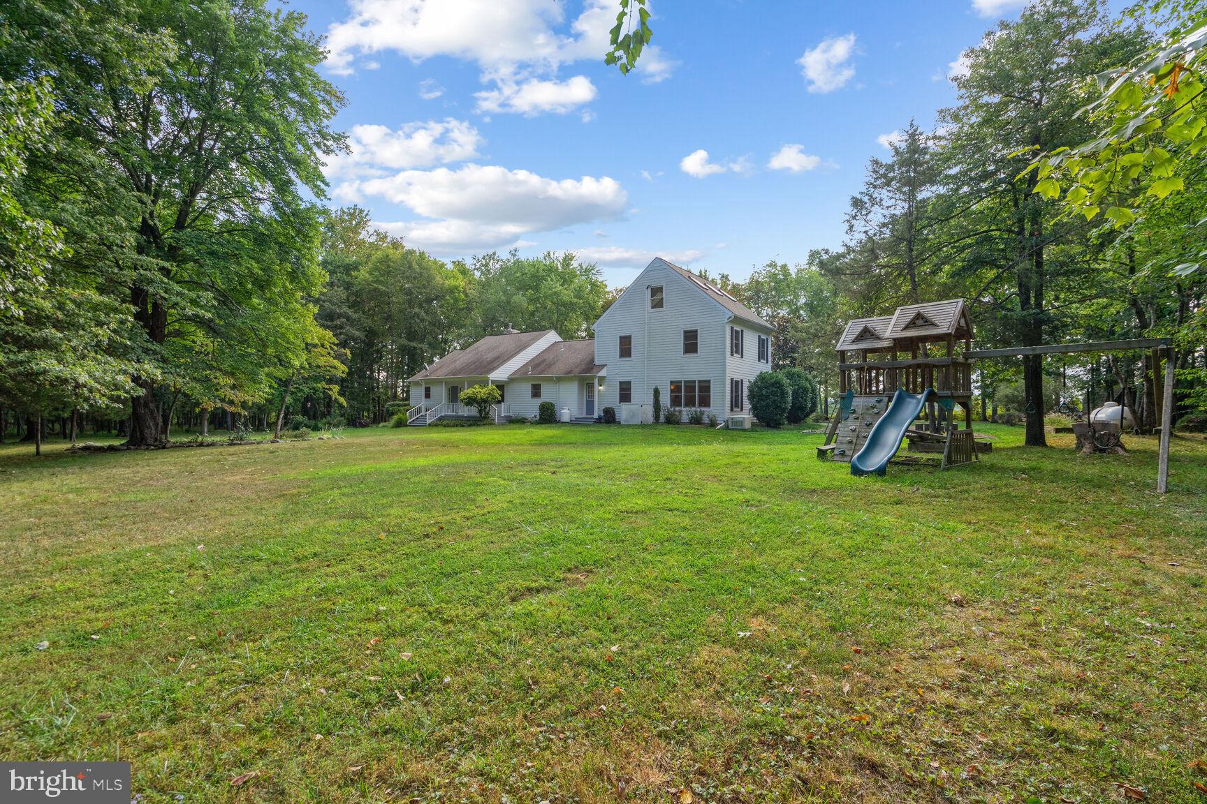 3309 Rectortown Road Marshall, VA 20115 - Photo 18 of 23 Swing set conveys and large backyard