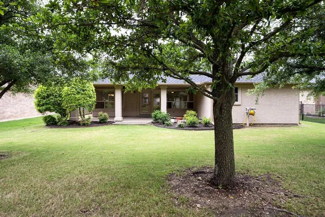 a front view of house with garden