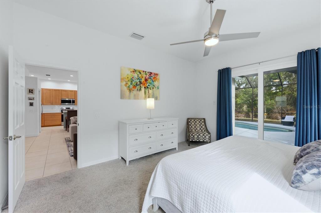 745 Fordingbridge Way Osprey, FL 34229 - Photo 18 of 53 a bedroom with a bed dresser and a window