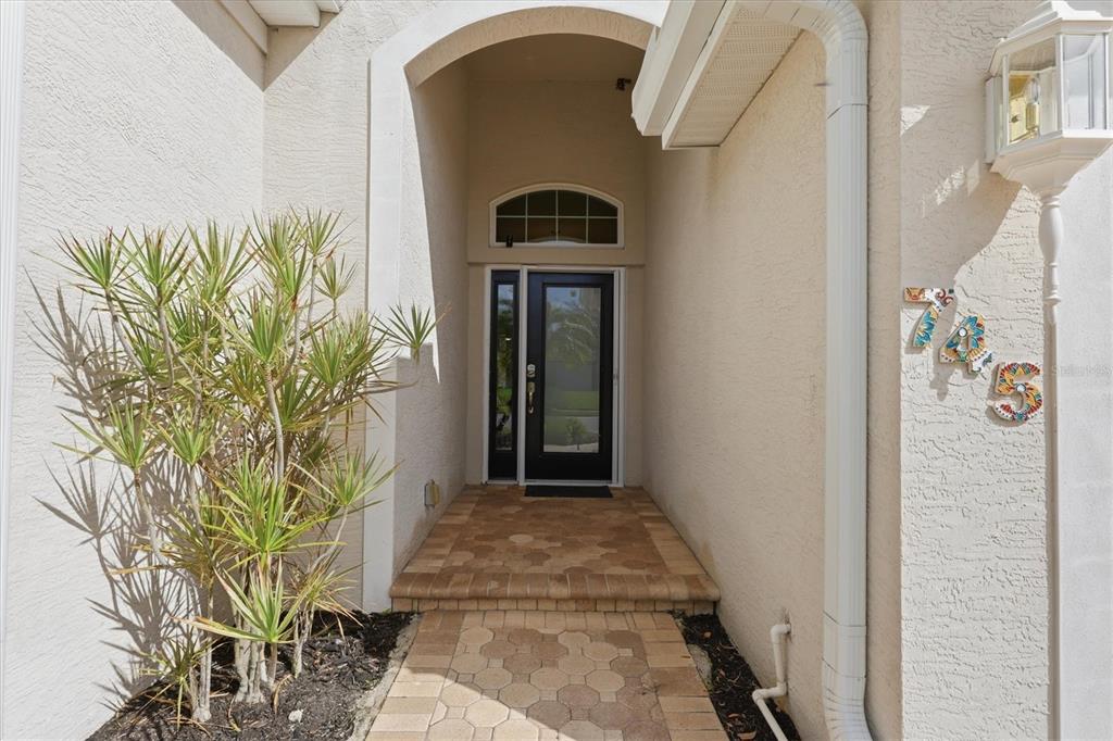 745 Fordingbridge Way Osprey, FL 34229 - Photo 2 of 53 a front view of a house with a yard