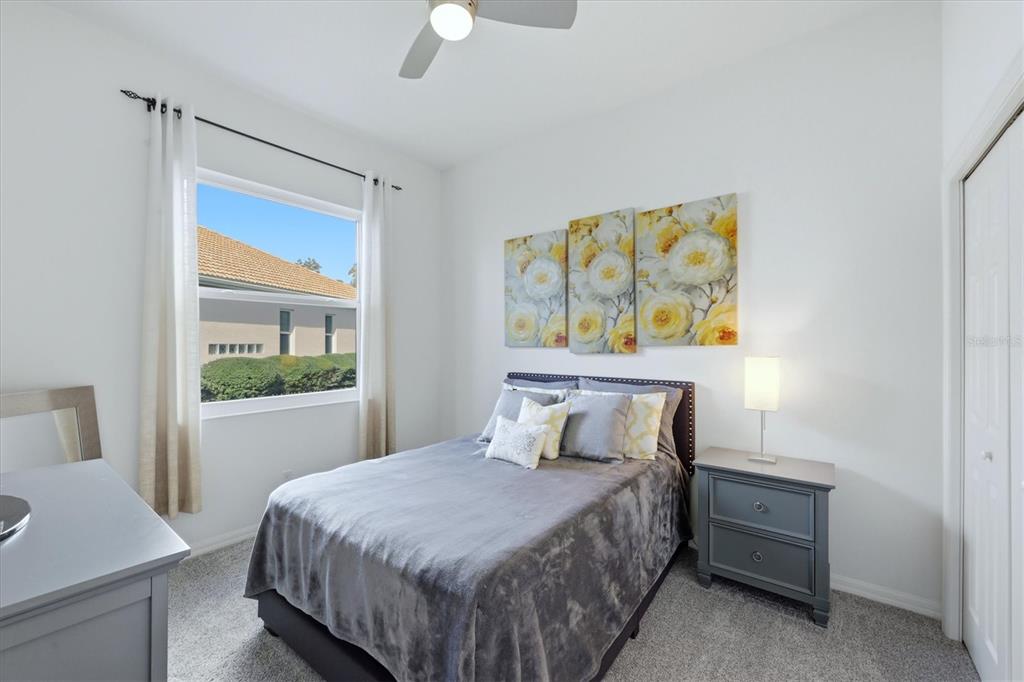 745 Fordingbridge Way Osprey, FL 34229 - Photo 26 of 53 a bedroom with a bed and a window