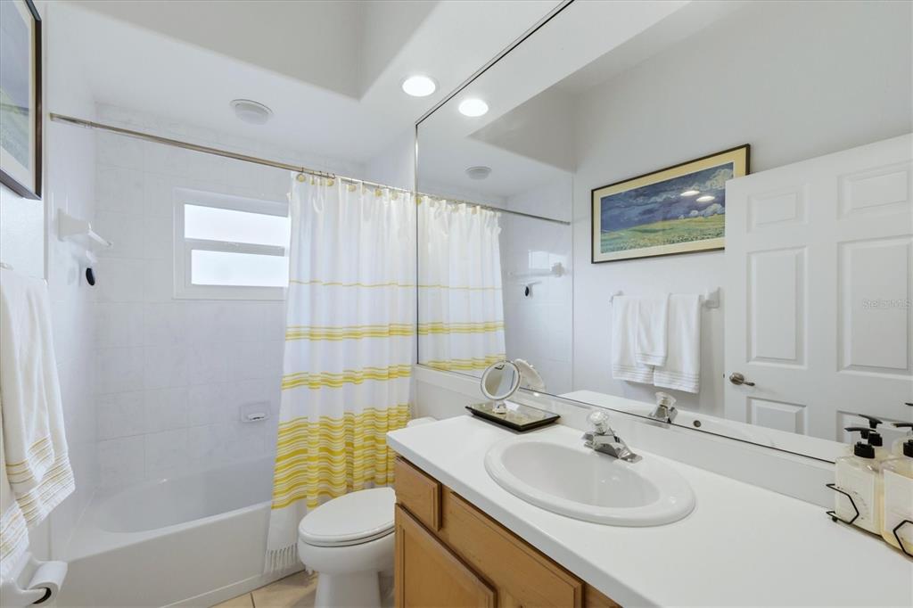 745 Fordingbridge Way Osprey, FL 34229 - Photo 29 of 53 a bathroom with a sink toilet and shower