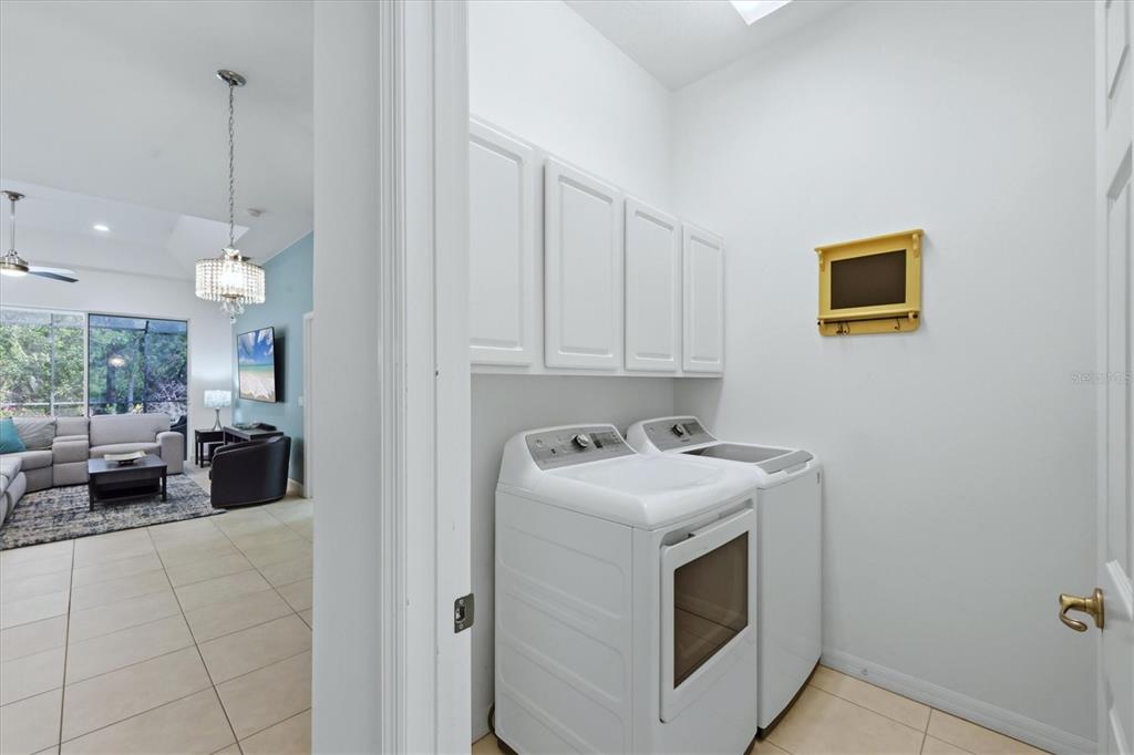 745 Fordingbridge Way Osprey, FL 34229 - Photo 30 of 53 a kitchen with a stove and a white cabinets