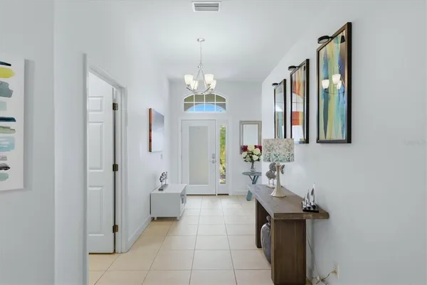 a spacious bathroom with a sink a mirror and a shower