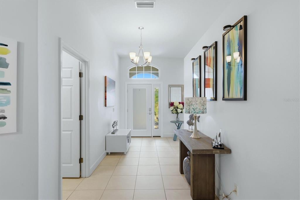 745 Fordingbridge Way Osprey, FL 34229 - Photo 3 of 53 a spacious bathroom with a sink a mirror and a shower