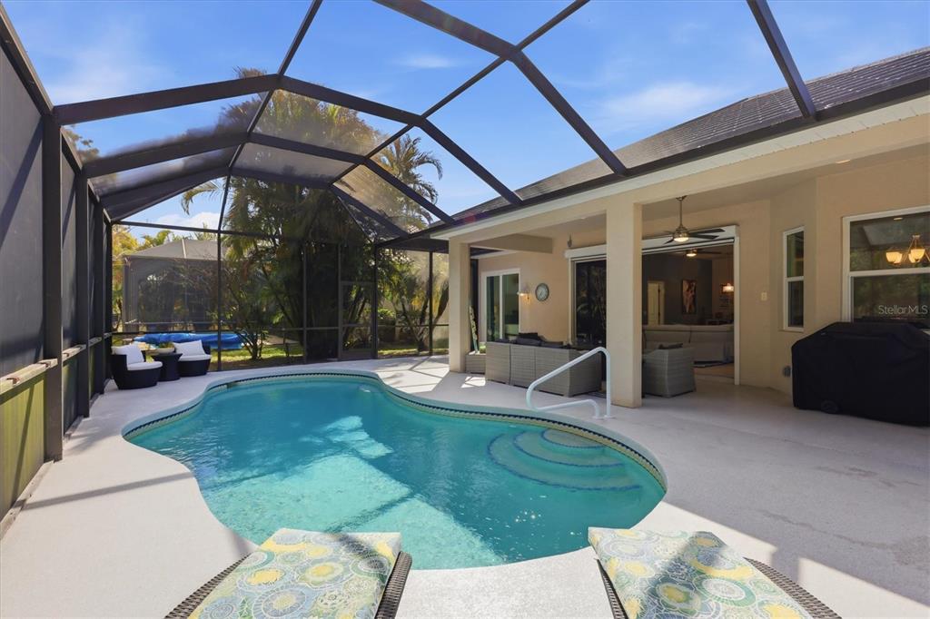 745 Fordingbridge Way Osprey, FL 34229 - Photo 36 of 53 a view of a house with backyard porch and sitting area