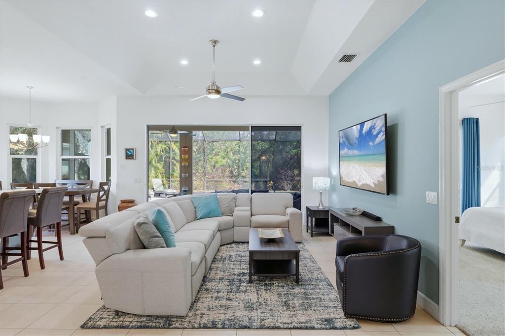745 Fordingbridge Way Osprey, FL 34229 - Photo 6 of 53 a living room with furniture and a large window