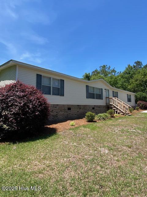 1951 Stanley Road Southwest Supply, NC 28462 - Photo 3 of 28 House Front 4