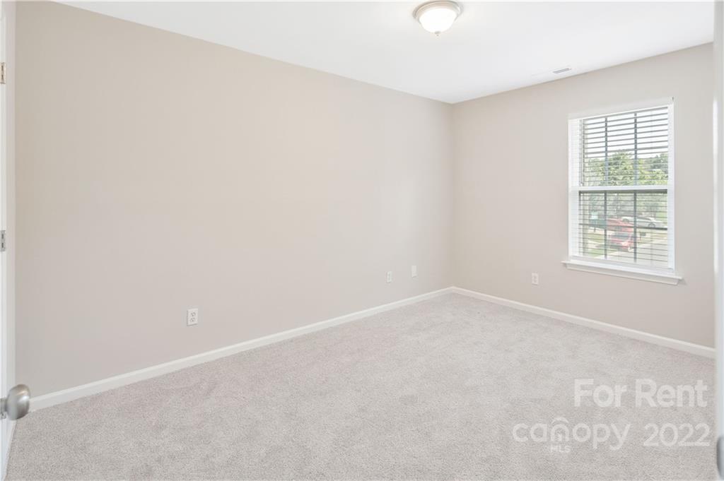 236 Pangle Drive Charlotte, NC 28217 - Photo 21 of 26 an empty room with a window