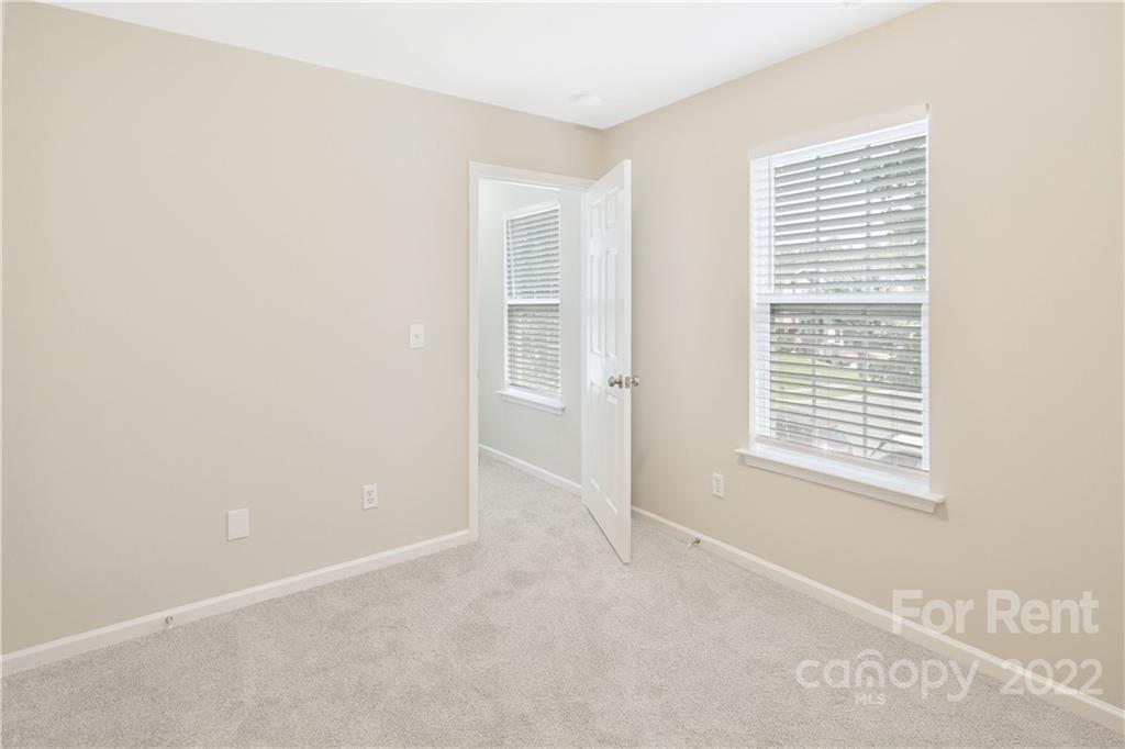 236 Pangle Drive Charlotte, NC 28217 - Photo 24 of 26 a view of an empty room with a window